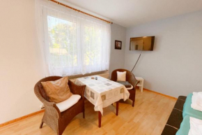 Bungalow Bergstrasse 3 Ferienwohnung 2, Loddin